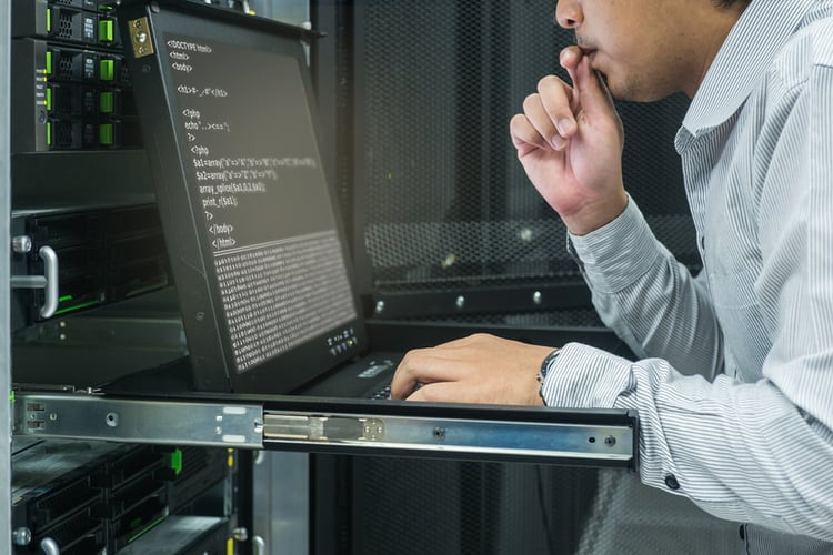 cyber-risk-management-IT-technician-computer